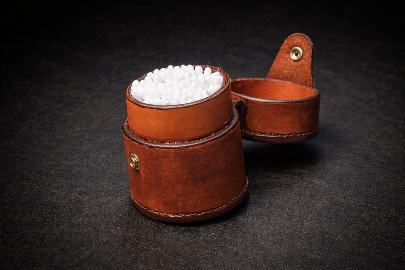 Leather Q-tip holder close-up shot